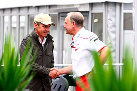 ohn Howett, President, Toyota F1 with Daniel Morelli, manager of Robert Kubica, at the Suzuka paddock