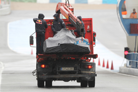 Webber's car is returning to the pits at Jerez