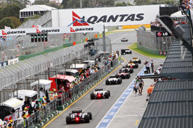 Cars leave the pits