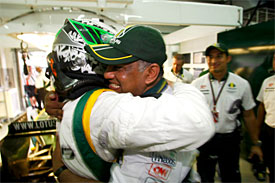 Heikki Kovalainen and Tony Fernandes after qualifying in Malaysia