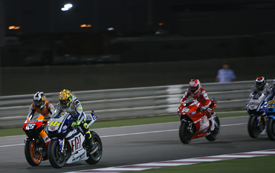 Dani Pedrosa challenges Valentino Rossi for the lead in Qatar