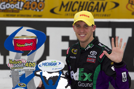 Denny Hamlin celebrates Michigan victory