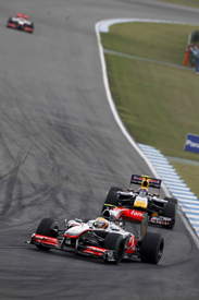 Lewis Hamilton leads Mark Webber in Germany