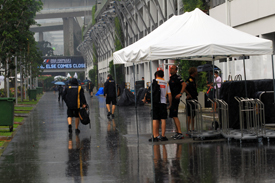 Rain falls in the Singapore paddock