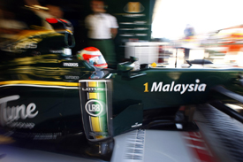 Jarno Trulli leaves the Lotus garage