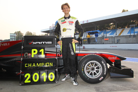 Romain Grosjean celebrates the Auto GP title