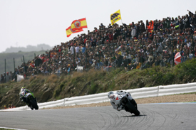 Jorge Lorenzo chases Valentino Rossi at Estoril