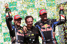 Sebastian Vettel, Christian Horner and Mark Webber on the Interlagos podium