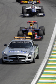 The safety car leads the field in Brazil