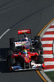 Felipe Massa races against Jenson Button in Melbourne