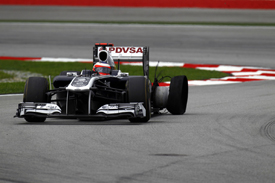 Rubens Barrichello, Williams, with a puncture at Sepang 2011