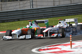 Kamui Kobayashi races with Adrian Sutil in Turkey