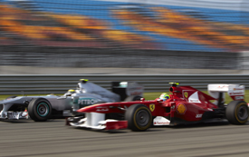 Felipe Massa races with Nico Rosberg in Turkey