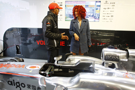 With time on his hands after retiring from the race, Lewis Hamilton shows Rihanna around the McLaren