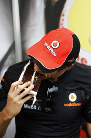 Button tucks into his celebratory cake