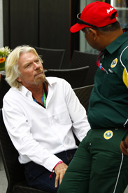 Richard Branson chats with Tony Fernandes in Montreal