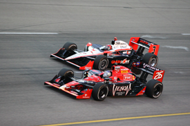 Marco Andretti races with Helio Castroneves at Iowa