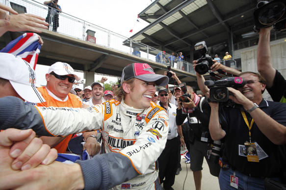 Dan Wheldon celebrates Indy 500 victory