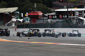 Heikki Kovalainen and Jarno Trulli collide at Spa