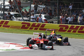 Fernando Alonso races with Sebastian Vettel at Monza