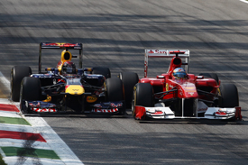 Sebastian Vettel races with Fernando Alonso at Monza