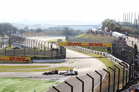 Mark Webber, Lewis Hamilton and Michael Schumacher nearly tangle at Suzuka