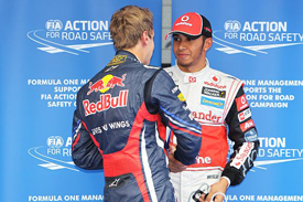 Sebastian Vettel congratulates Lewis Hamilton on Korea pole