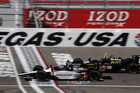 Wheldon and Tracy run together in practice at Las Vegas