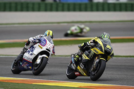 Cal Crutchlow leads Karel Abraham at Valencia