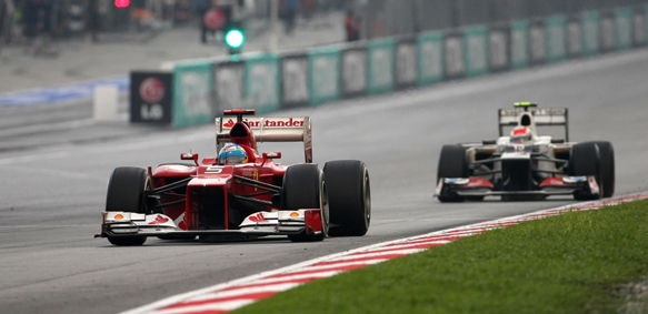 Fernando Alonso Sergio Perez Ferrari Sauber 2012 Malaysian Grand Prix