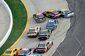 Clint Bowyer crashes into the Hendrick duo