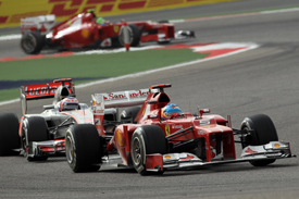 Fernando Alonso leads Jenson Button in Bahrain