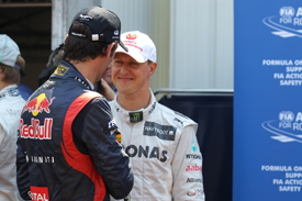 Michael Schumacher and Mark Webber