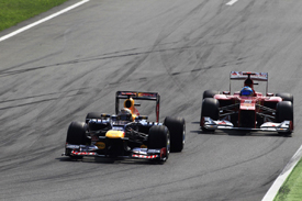 Sebastian Vettel races with Fernando Alonso at Monza