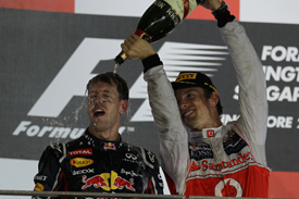 Sebastian Vettel and Jenson Button on the Singapore podium
