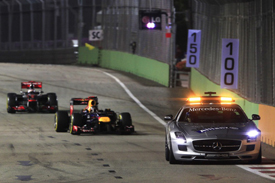 Sebastian Vettel leads Jenson Button in Singapore