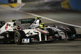 Sergio Perez races Nico Rosberg in Singapore