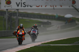 Dani Pedrosa leads Jorge Lorenzo at Sepang