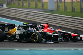 Timo Glock battles with Vitaly Petrov, Abu Dhabi 2012