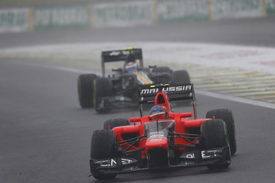 Charles Pic leads Vitaly Petrov at Interlagos