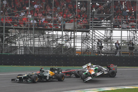 Nico Hulkenburg collides with Lewis Hamilton at Interlagos