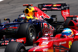 Sebastian Vettel leads Fernando Alonso at Interlagos