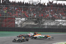 Nico Hulkenburg collides with Lewis Hamilton at Interlagos