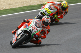 Nicky Hayden leads Valentino Rossi