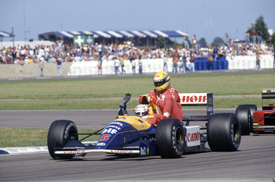 Ayrton Senna rides on Nigel Mansell's Williams, British GP 1991, Silverstone