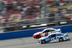 Busch holds off Larson to clinch win