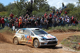 Ogier holds narrow lead in Portugal