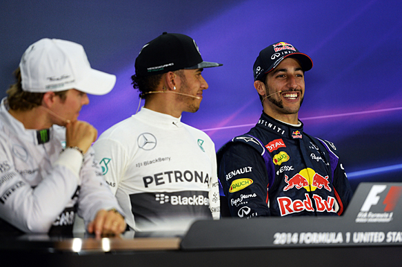 Lewis Hamilton and Nico Rosberg look at Daniel Ricciardo, US GP press conference 2014