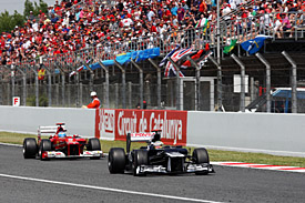 Pastor Maldonado, Williams, leads Fernando Alonso, Ferrari, Spanish GP 2012, Barcelona