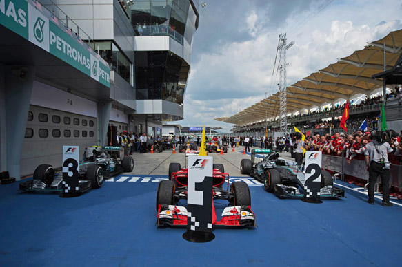 Ferrari and Mercedes in Malaysian GP parc ferme 2015